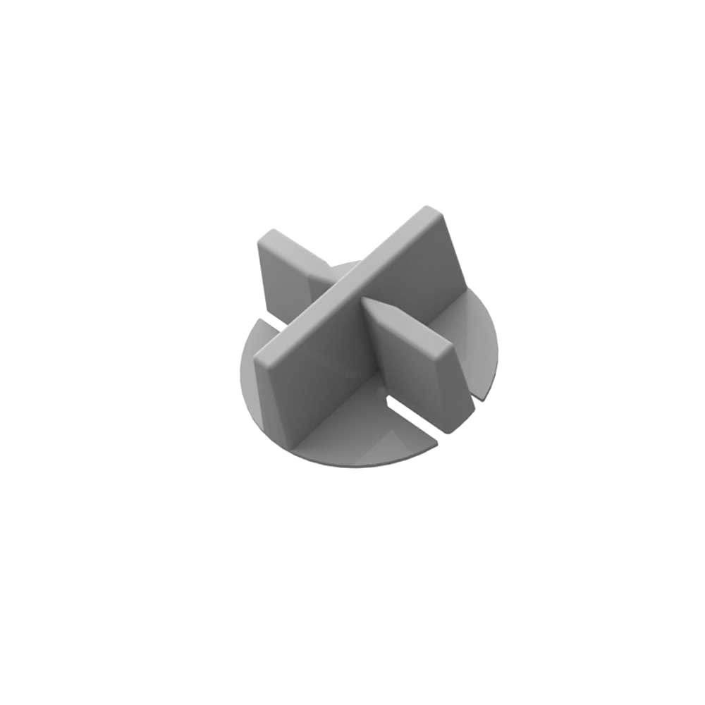 Grille en plastique gris, forme circulaire, équipée d'ailettes verticales et diagonales. Aucune référence ni marque apparente. Fond blanc neutre.